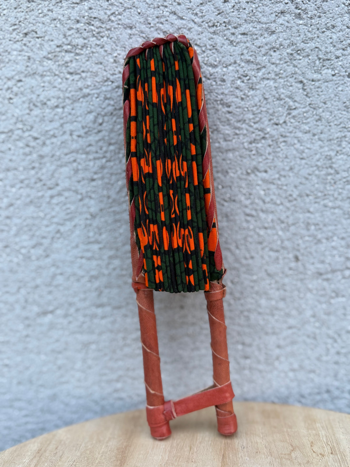 Éventail pliable wax vert & orange – Graphique