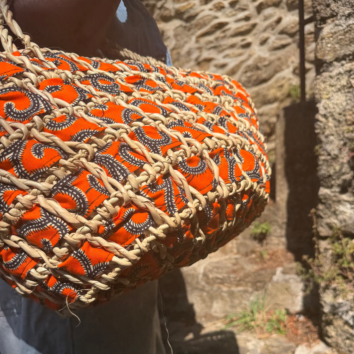 Panier tressé en wax orange