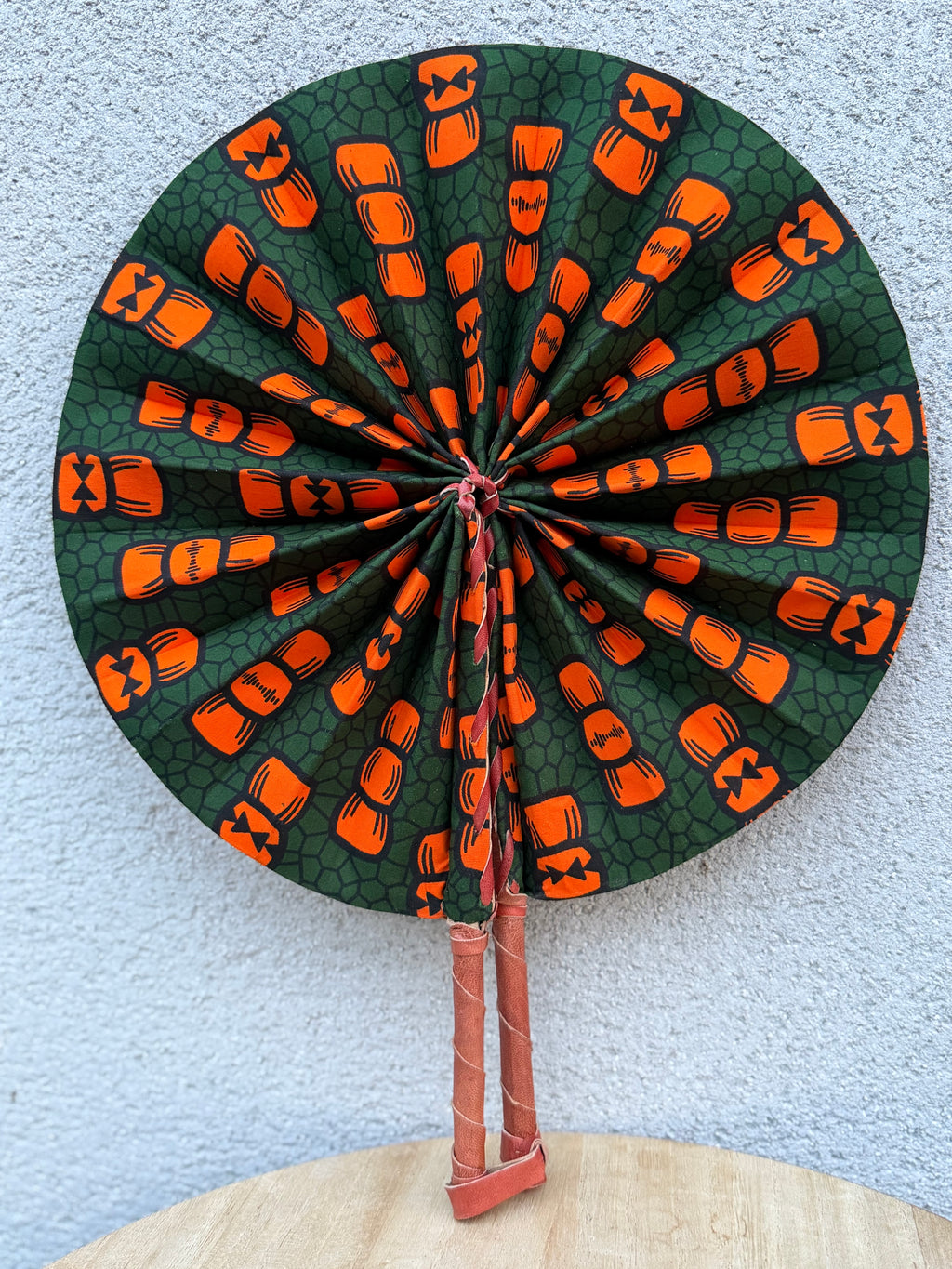 Éventail pliable wax vert & orange – Graphique