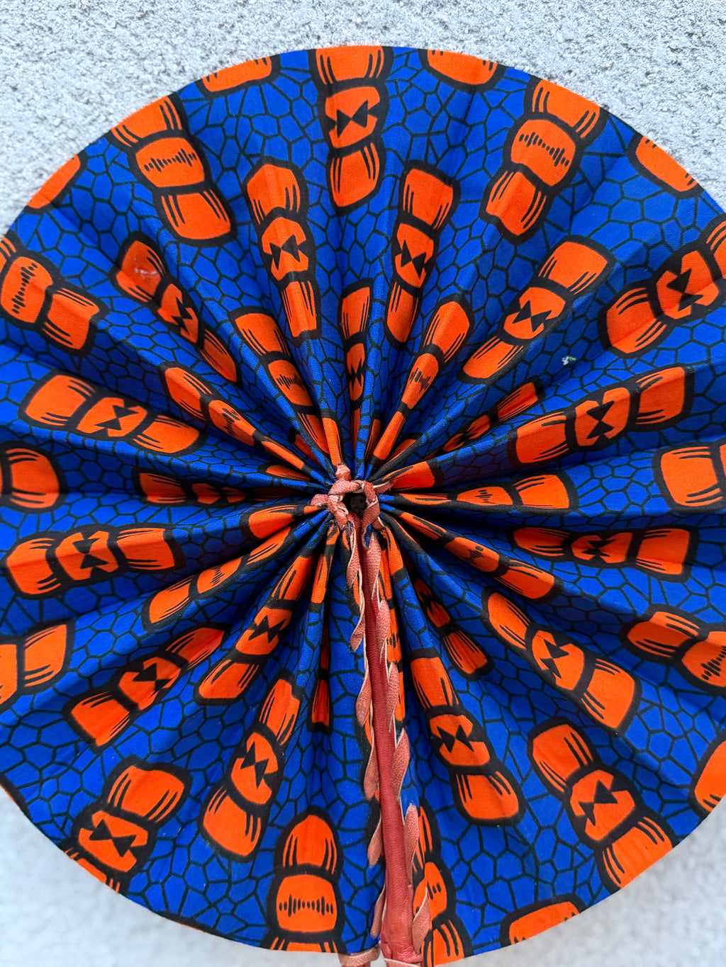 Éventail pliable wax bleu & orange – Graphique