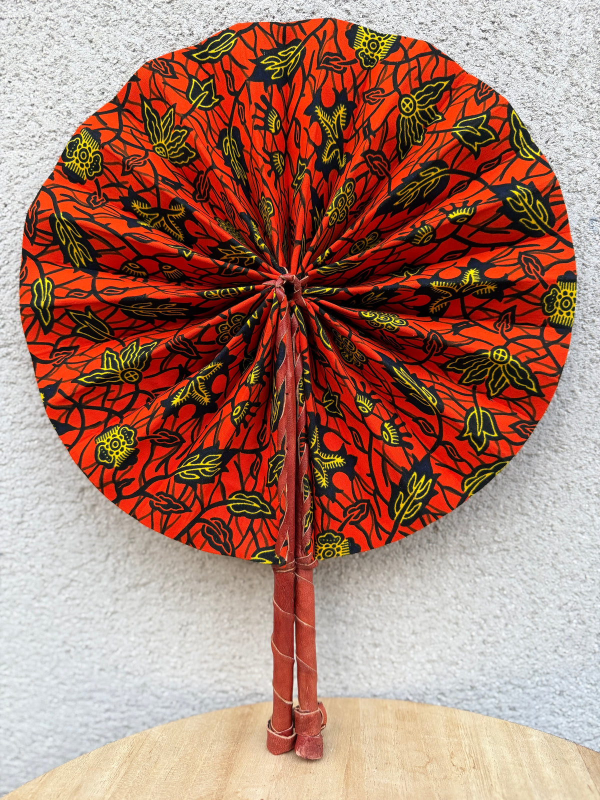 Éventail wax orange pliable – Motif floral